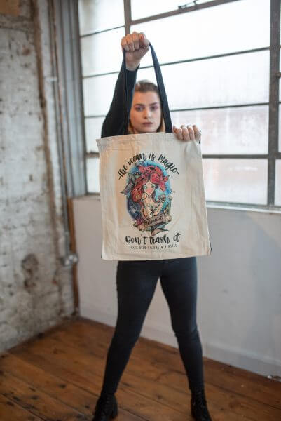 Organic shopper with black handles and gusset. Plastic pollution mermaid design by eco-ethical brand Viva La Vegan