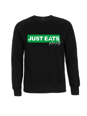 Flat lay of black raglan sleeve sweatshirt Just Eats Plants print by Eco -ethical brand Viva La Vegan