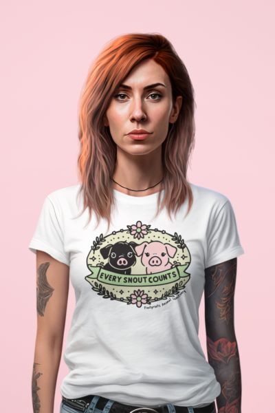 Young woman wearing a white tshirt with a cute Every snout counts graphic