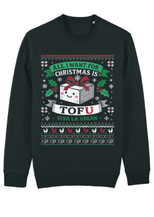A black organic cotton Christmas jumper with a cheerful cartoon block of tofu at the center, rosy cheeks and a smile, surrounded by festive snowflakes, holly, stars, and hearts. Above it reads “ALL I WANT FOR CHRISTMAS IS,” below it “TOFU” with the letter U in red, and underneath “VIVA LA VEGAN” in green. Decorative pixel-style patterns frame the design, giving it a playful holiday knit look.